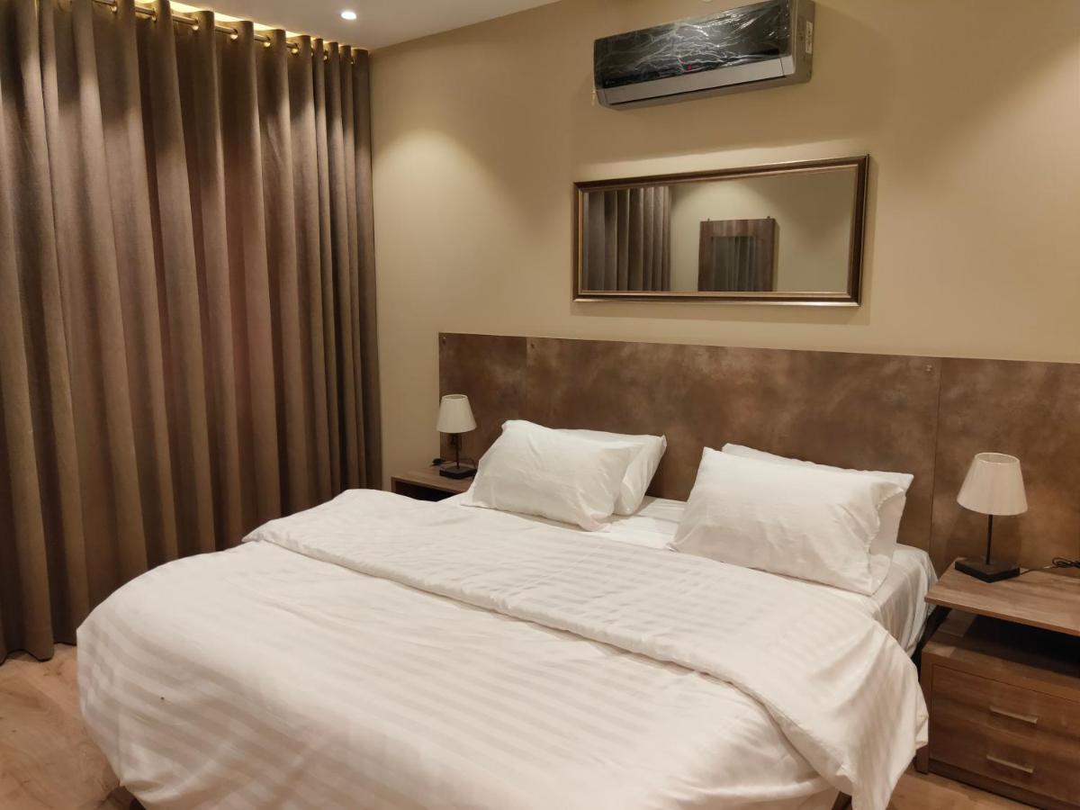 Hamsun Shahrah-E-Faisal Hotel Karachi Bagian luar foto